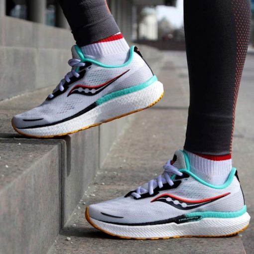 کتانی رانینگ ساکونی سفید فیروزه ای Saucony Triumph 19 White Yellow Green Black