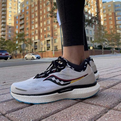 کتانی رانینگ ساکونی سفید مشکی زرد Saucony Triumph 19 White Black Yellow